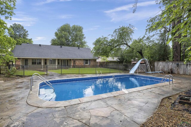 3 Ramblewood Dr, Longview, TX 75605 - view of pool featuring a water slide and a patio area