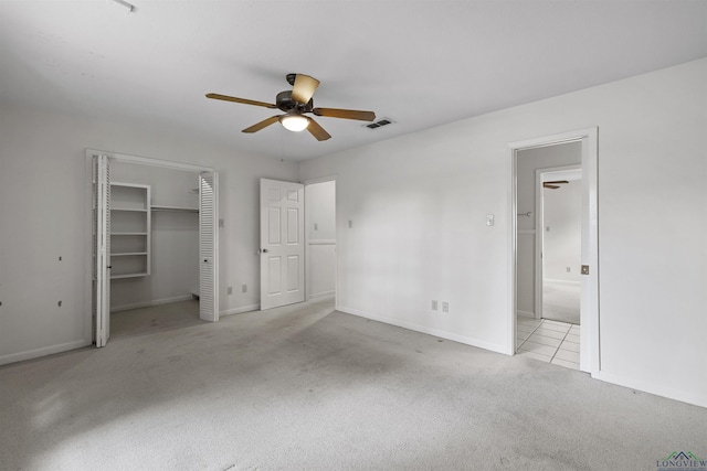 3 Ramblewood Dr, Longview, TX 75605 - unfurnished bedroom with carpet flooring, baseboards, and a ceiling fan