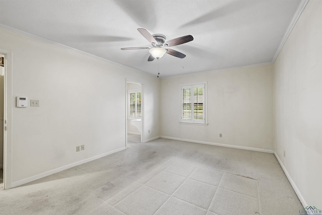 3 Ramblewood Dr, Longview, TX 75605 - spare room with ceiling fan, light carpet, ornamental molding, and baseboards