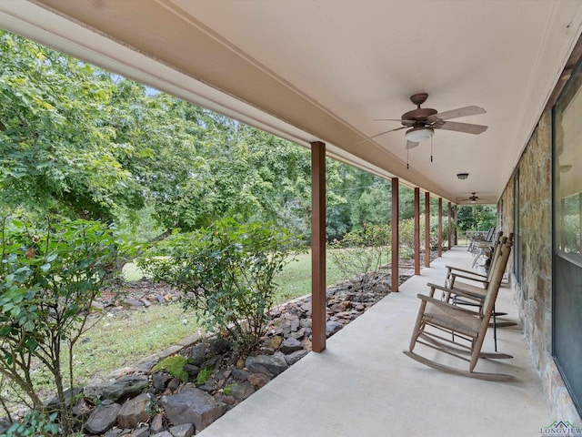 view of patio featuring ceiling fan