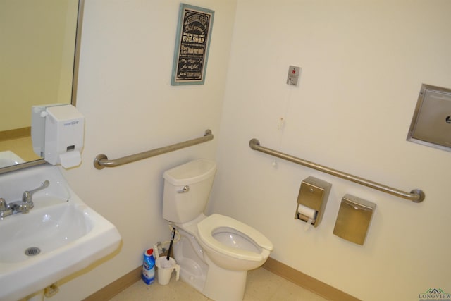 bathroom with sink and toilet