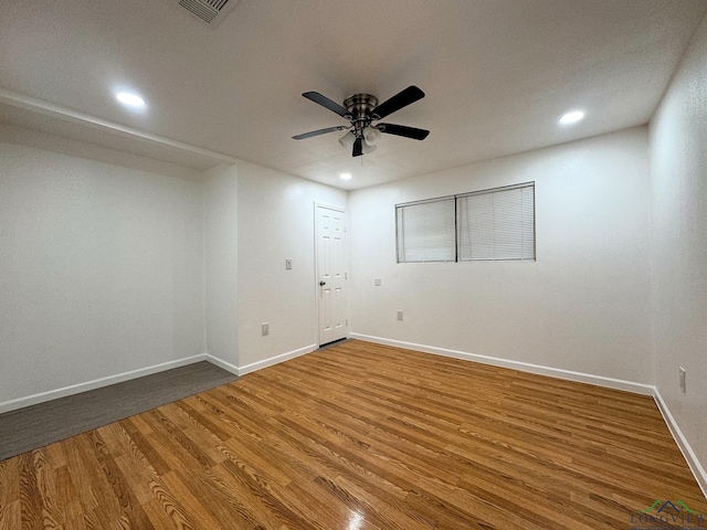 unfurnished room featuring wood-type flooring and ceiling fan