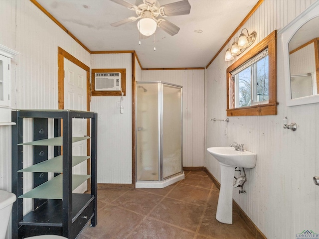 bathroom with tile patterned floors, an enclosed shower, an AC wall unit, and crown molding