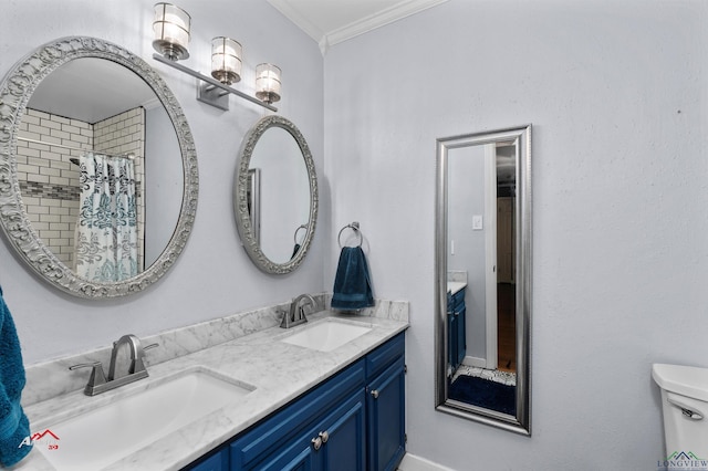 bathroom featuring a shower with shower curtain, vanity, toilet, and crown molding