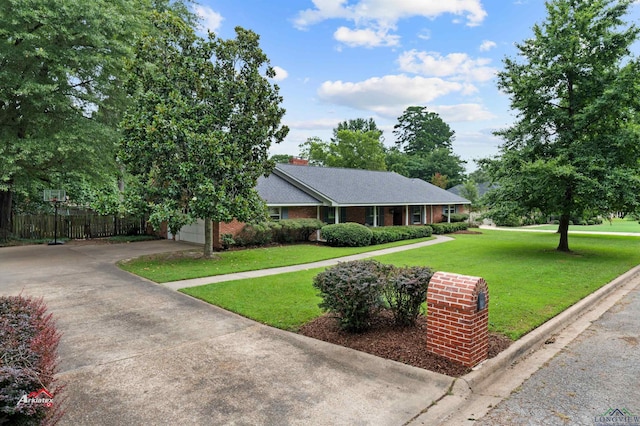 view of front facade featuring a garage and a front lawn