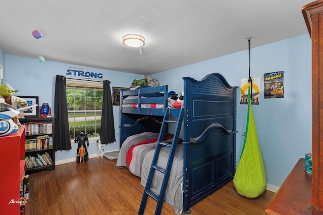 bedroom featuring wood-type flooring