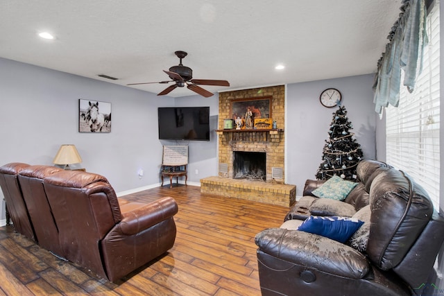 3955 E US Highway 79, Henderson, TX 75652 - living room with ceiling fan, hardwood / wood-style flooring, recessed lighting, baseboards, and a fireplace