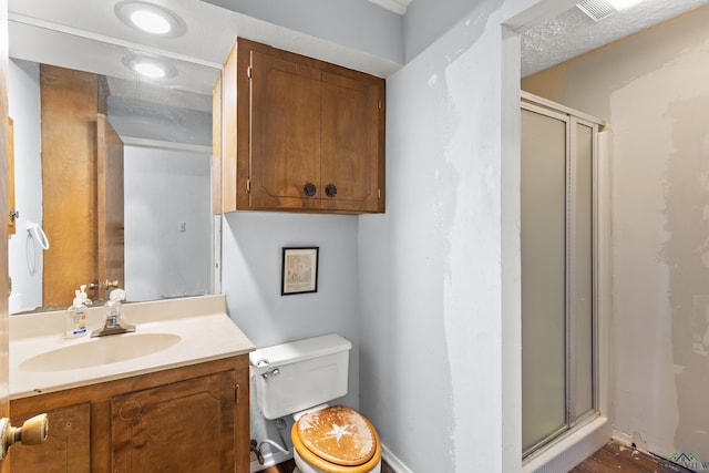 3955 E US Highway 79, Henderson, TX 75652 - full bathroom featuring a shower stall, vanity, and toilet