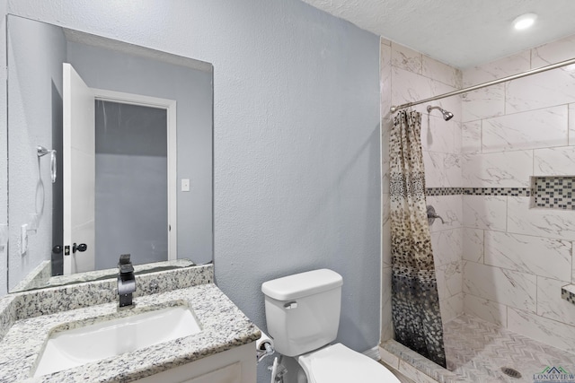 3955 E US Highway 79, Henderson, TX 75652 - bathroom featuring vanity, toilet, and a stall shower