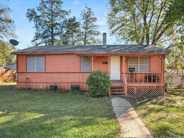 view of front of home with a front yard