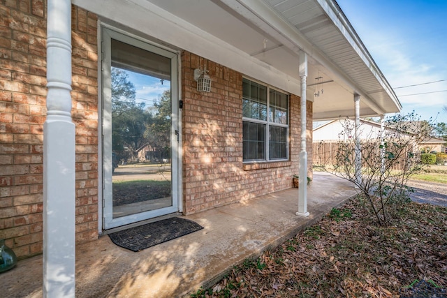 property entrance featuring covered porch