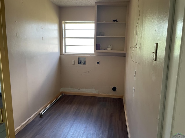 laundry area with dark hardwood / wood-style floors, hookup for an electric dryer, hookup for a washing machine, and a textured ceiling