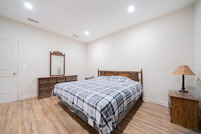 bedroom featuring light hardwood / wood-style flooring