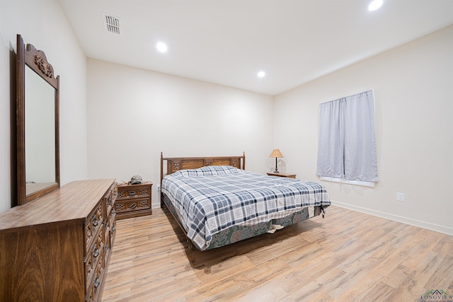 bedroom featuring light hardwood / wood-style flooring