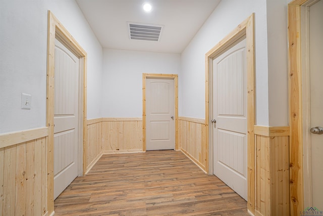 hallway featuring wood-type flooring