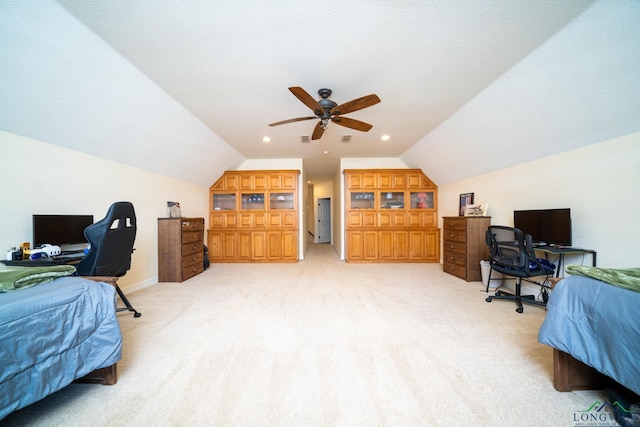 bedroom featuring light carpet, vaulted ceiling, and ceiling fan