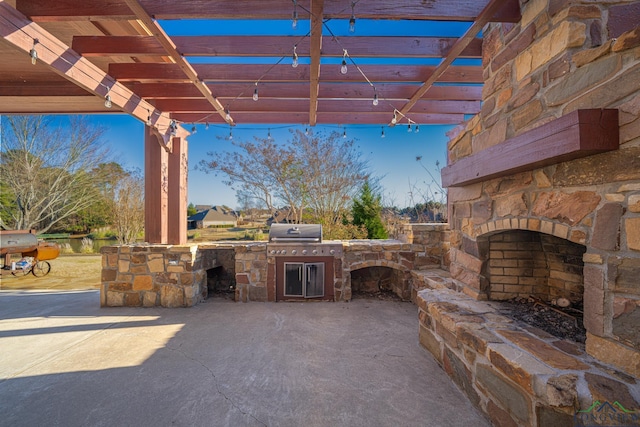 view of patio featuring area for grilling, a grill, a pergola, and an outdoor stone fireplace