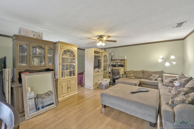 212 W W Ctr, White Oak, TX 75693 - living room featuring ornamental molding, a ceiling fan, and light wood finished floors