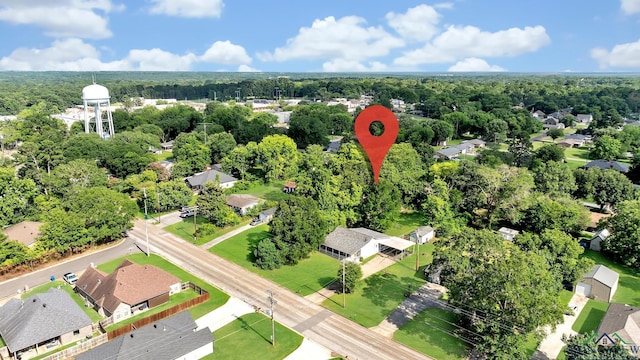 212 W W Ctr, White Oak, TX 75693 - aerial view of a heavily wooded area