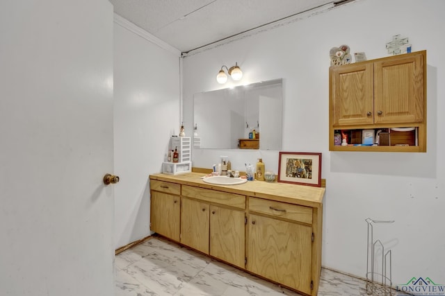 212 W W Ctr, White Oak, TX 75693 - bathroom featuring marble finish flooring, vanity, and crown molding