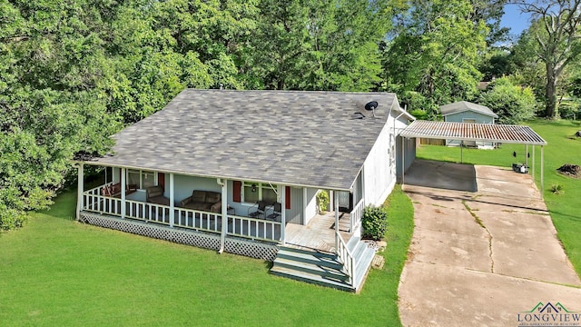 212 W W Ctr, White Oak, TX 75693 - view of front of property with roof with shingles, a front yard, concrete driveway, and a porch