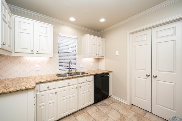 kitchen featuring light stone counters, dishwasher, sink, and white cabinets