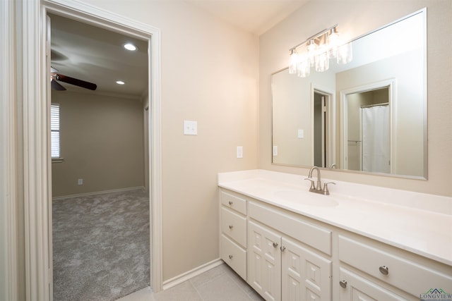 bathroom with vanity, tile patterned flooring, and ceiling fan