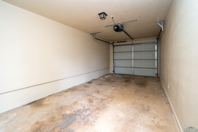 garage featuring a garage door opener