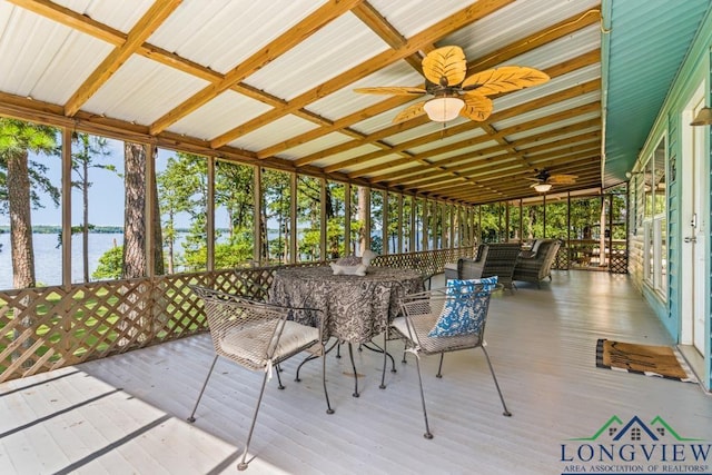 263 Crestwood Loop, Avinger, TX 75630 - sunroom with a water view, a ceiling fan, outdoor dining area, and healthy amount of natural light