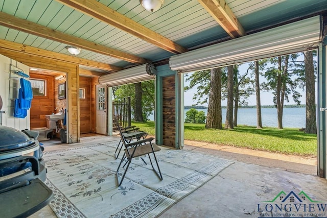 263 Crestwood Loop, Avinger, TX 75630 - view of patio / terrace with a water view