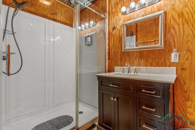 263 Crestwood Loop, Avinger, TX 75630 - bathroom featuring a shower stall, vanity, and wooden walls