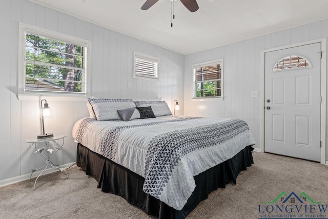 263 Crestwood Loop, Avinger, TX 75630 - carpeted bedroom featuring ceiling fan and baseboards