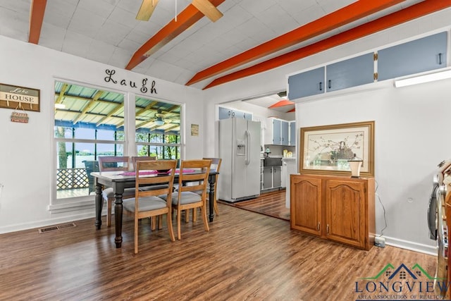 263 Crestwood Loop, Avinger, TX 75630 - dining area featuring a ceiling fan, wood finished floors, and beam ceiling