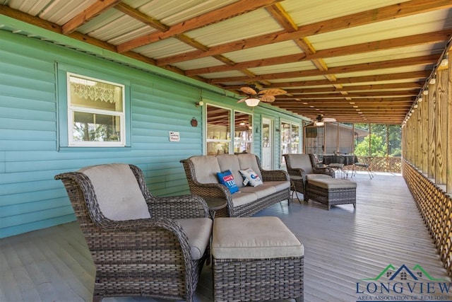 263 Crestwood Loop, Avinger, TX 75630 - wooden deck with ceiling fan and outdoor lounge area