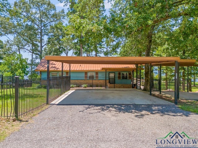 263 Crestwood Loop, Avinger, TX 75630 - view of car parking with driveway
