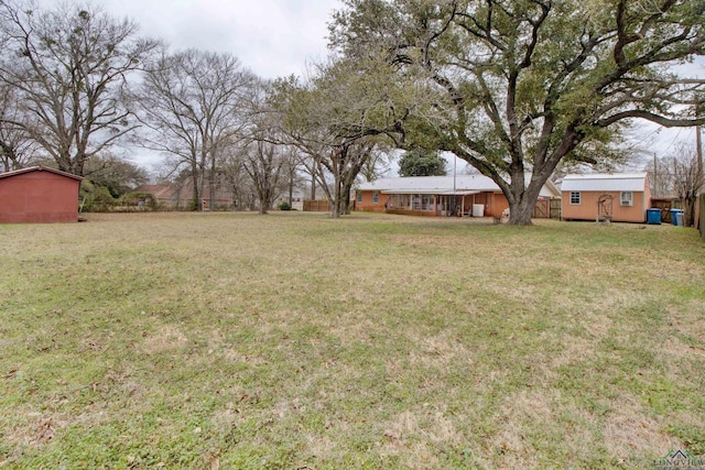 view of yard with a storage shed