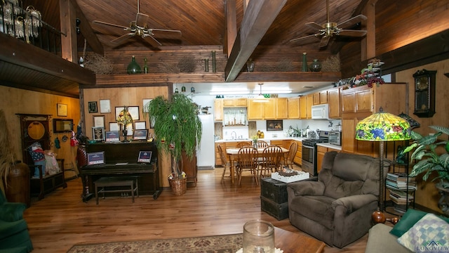 living room with beam ceiling, wooden ceiling, high vaulted ceiling, and wood-type flooring