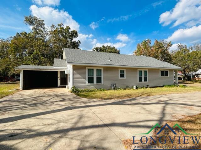 ranch-style home with a garage