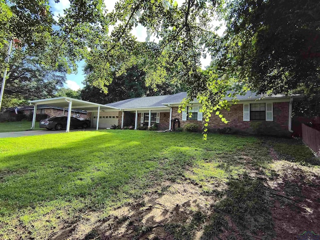 1101 N Idlewood Dr, White Oak, TX 75693 - single story home with an attached garage, an attached carport, brick siding, and driveway