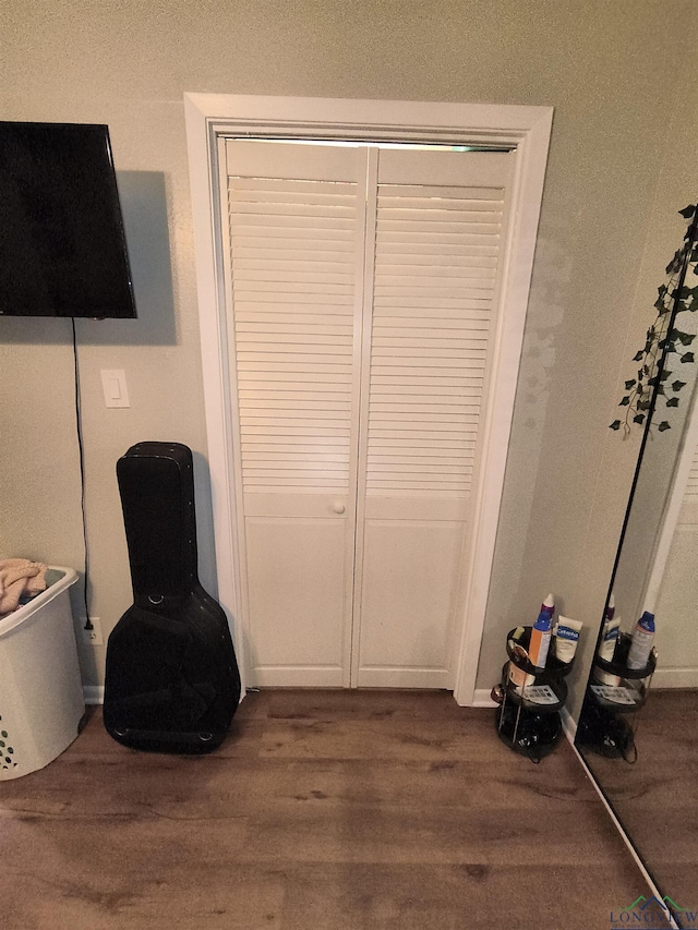 1101 N Idlewood Dr, White Oak, TX 75693 - unfurnished room featuring wood finished floors and baseboards