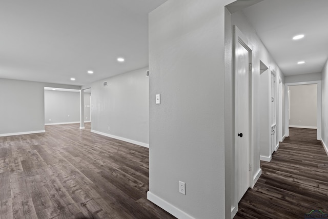 813 Kenwood Ln, Longview, TX 75604 - hall with dark wood finished floors, recessed lighting, and baseboards