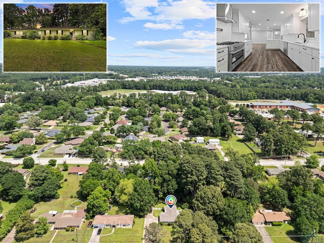 813 Kenwood Ln, Longview, TX 75604 - drone / aerial view of a tree filled landscape
