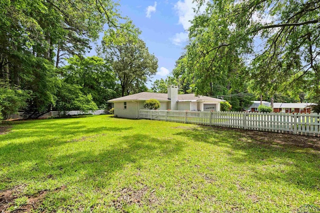 813 Kenwood Ln, Longview, TX 75604 - view of yard with a garage