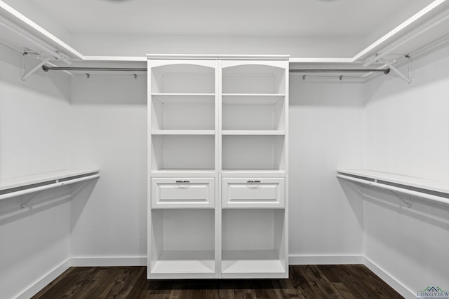 813 Kenwood Ln, Longview, TX 75604 - spacious closet with dark wood-style flooring