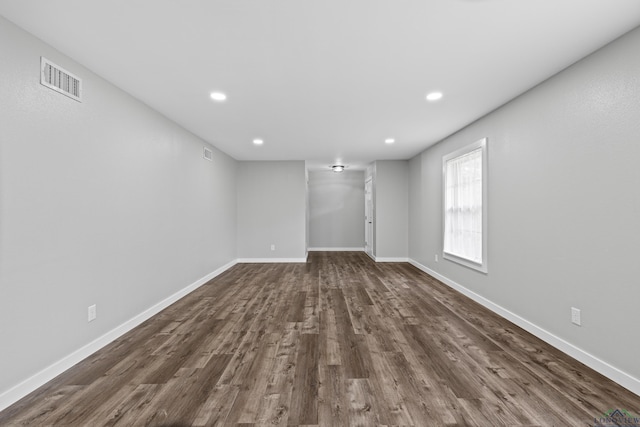 813 Kenwood Ln, Longview, TX 75604 - below grade area featuring dark wood-style floors, baseboards, and recessed lighting