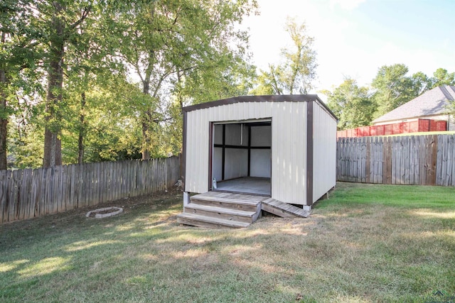 view of outdoor structure featuring a yard