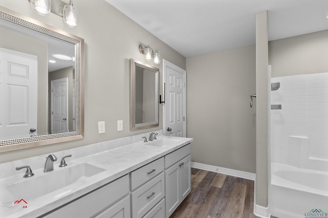 bathroom with vanity, separate shower and tub, and wood-type flooring