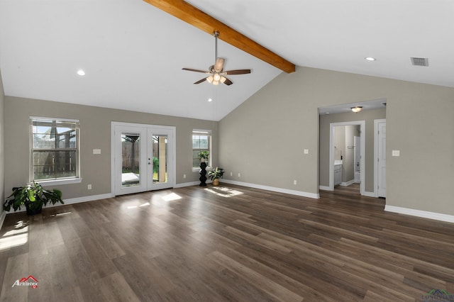 unfurnished living room with french doors, lofted ceiling with beams, ceiling fan, and dark wood-type flooring