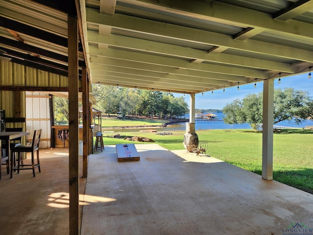 view of patio / terrace with a water view