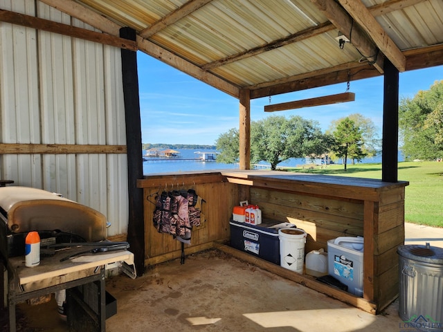 view of patio / terrace with a water view